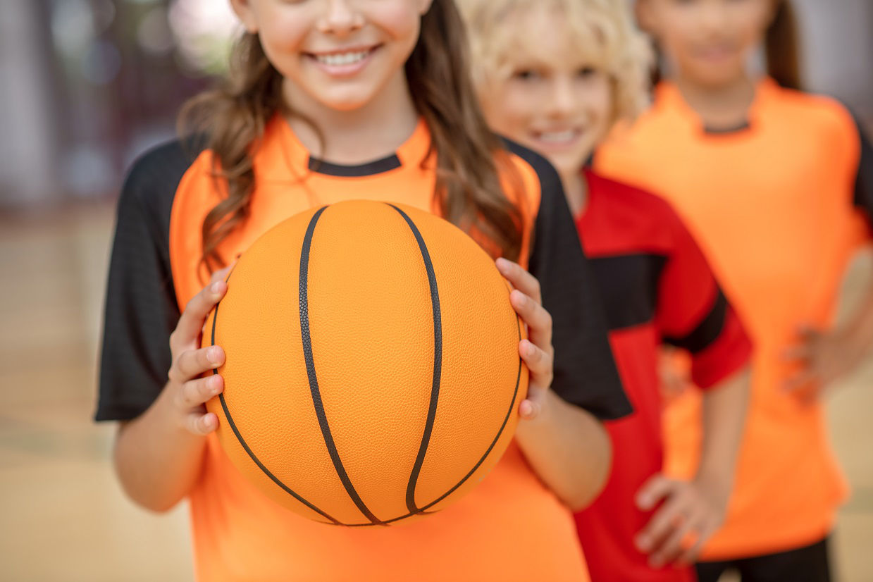 Basketball. Close up picture of kids with a ball